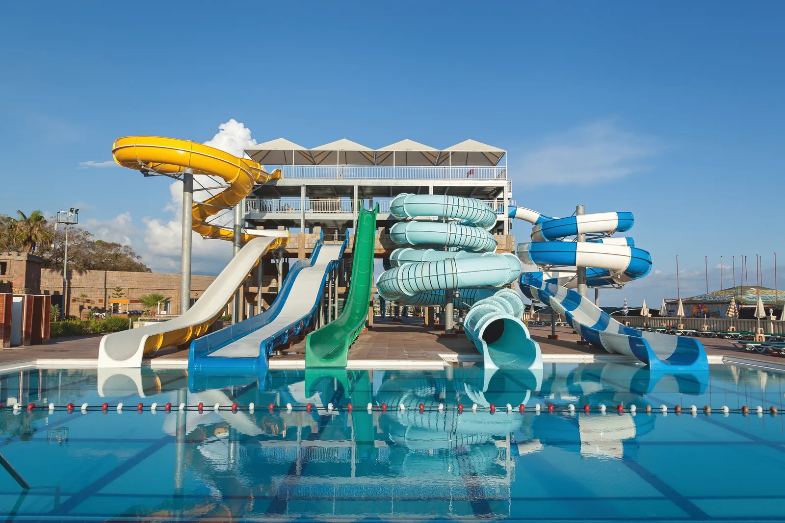 Water park pool with slides
